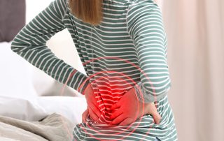 A woman with lower back pain