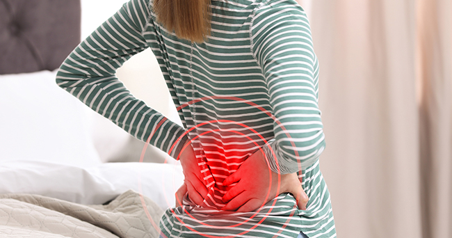 A woman with lower back pain